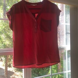 Small red short sleeved blouse